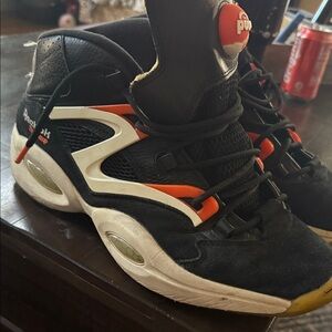 Reebok Black and White Shoes with Orange Highlights